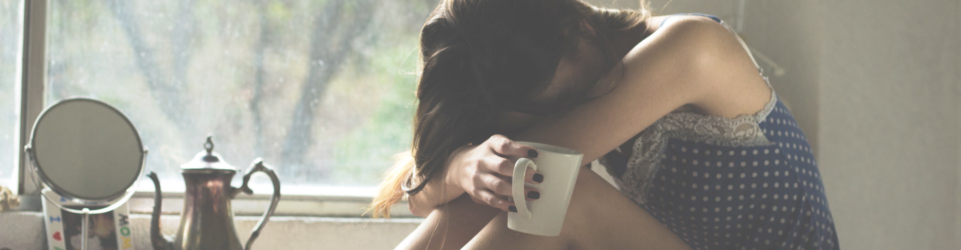 Woman upset, considering calling in sick with Tonsillitis - Be honest with your employer. If their attempts to encourage your workforce back into the office are making you anxious, tell them it's affecting the mental health for working mums