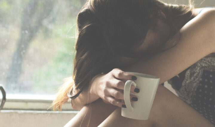 Woman upset, considering calling in sick with Tonsillitis - Be honest with your employer. If their attempts to encourage your workforce back into the office are making you anxious, tell them it's affecting the mental health for working mums