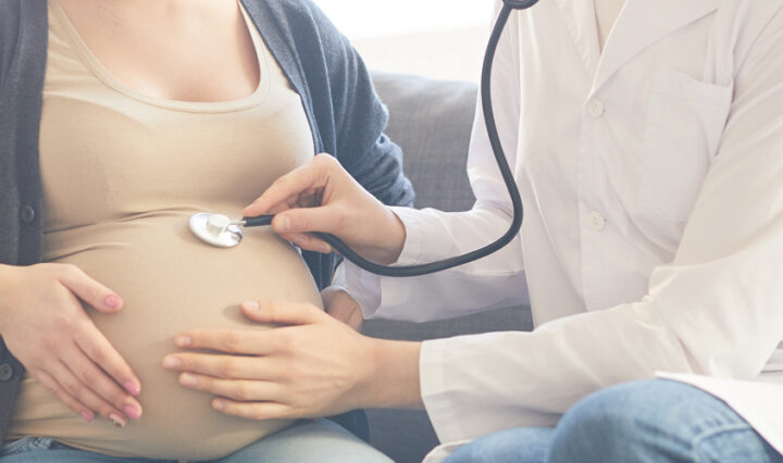 pregnancy - Gynaecologist examining mum to be