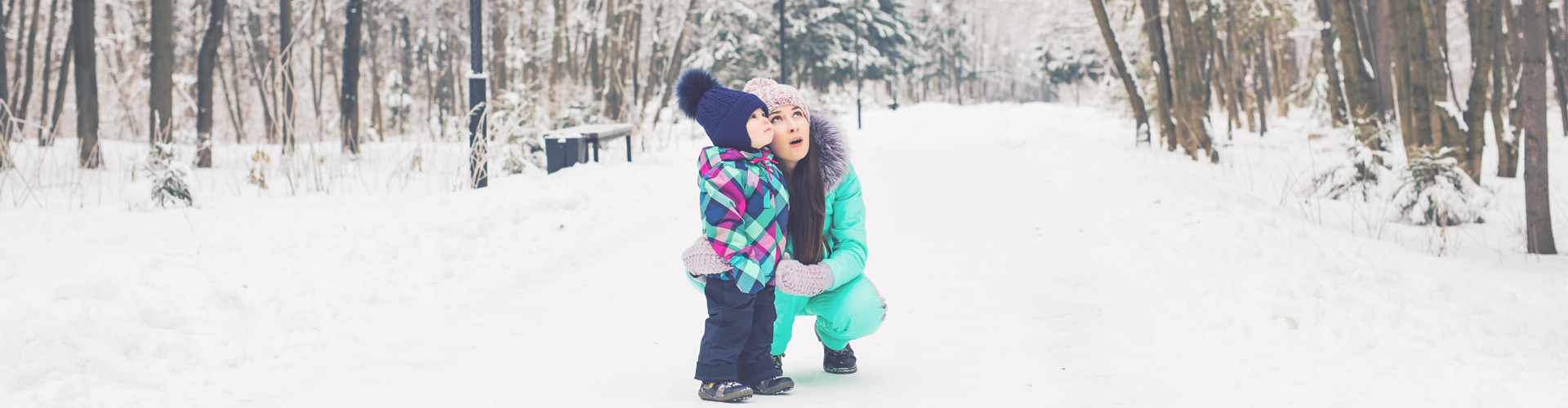 child and mum in snow
