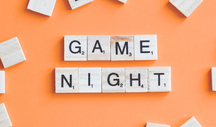 scrabble tiles spelling out games night