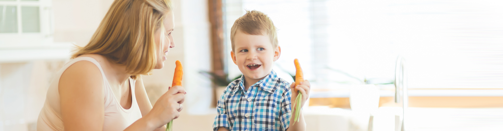 child and mother eating raw carrots - meal ideas for picky eaters